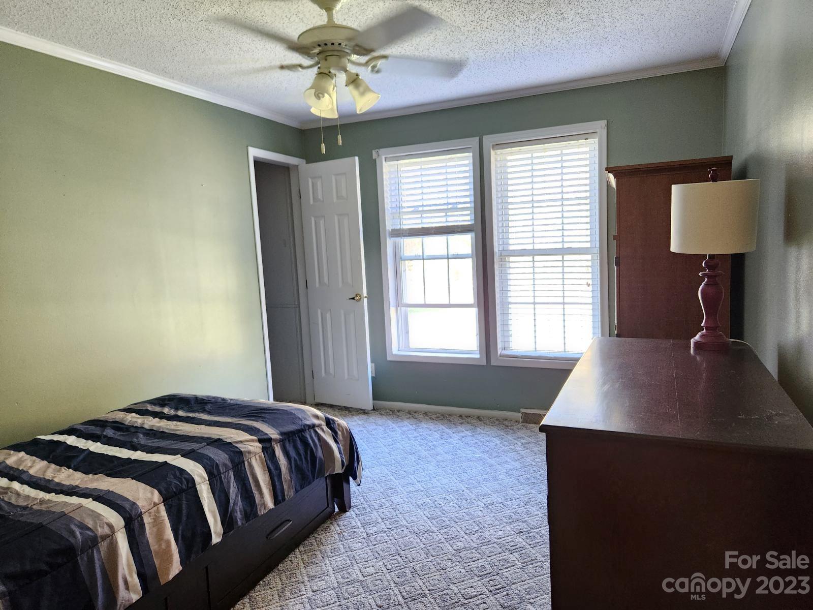1952 Haire Road Fort Mill, SC 29715 - Photo 18 of 27 a bedroom with a bed and a window