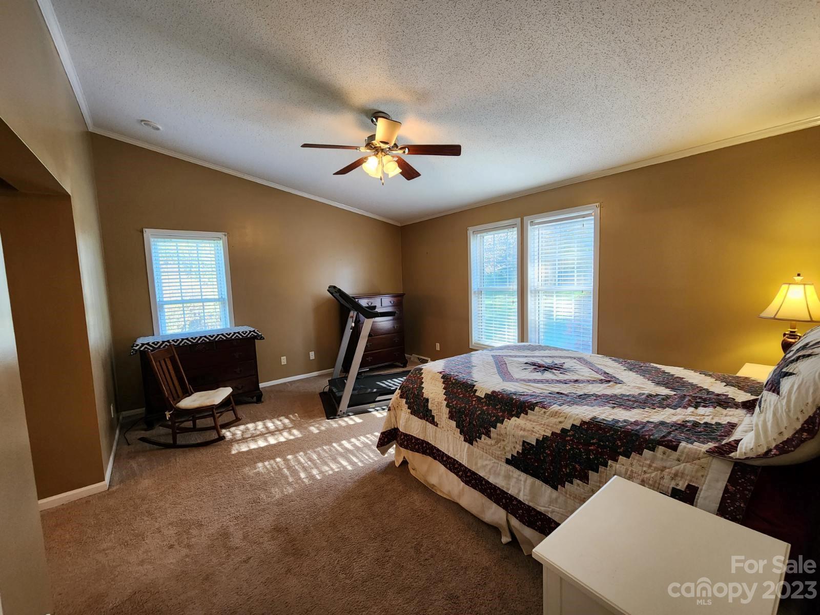 1952 Haire Road Fort Mill, SC 29715 - Photo 20 of 27 a bed sitting in a room next to a window