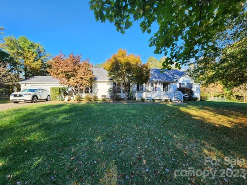 1952 Haire Road Fort Mill, SC 29715 - Photo 2 of 27 a view of house with outdoor space and garden
