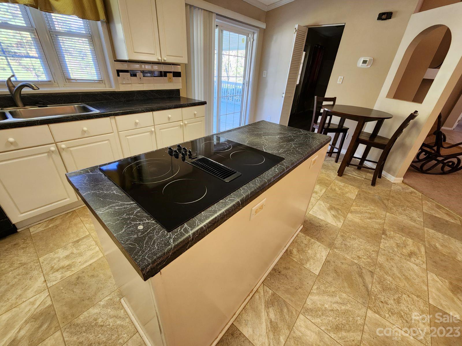 1952 Haire Road Fort Mill, SC 29715 - Photo 8 of 27 a kitchen with a stove and a sink