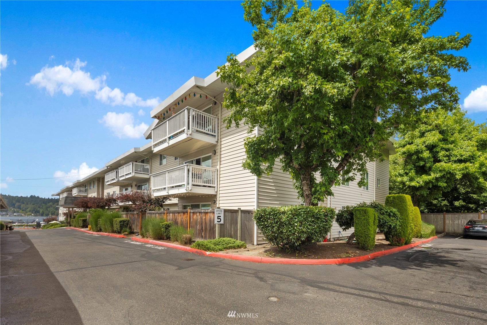 5021 Ripley Lane North, Unit 202 Renton, WA 98056 - Photo 34 of 35 a view of a street with a building in the background