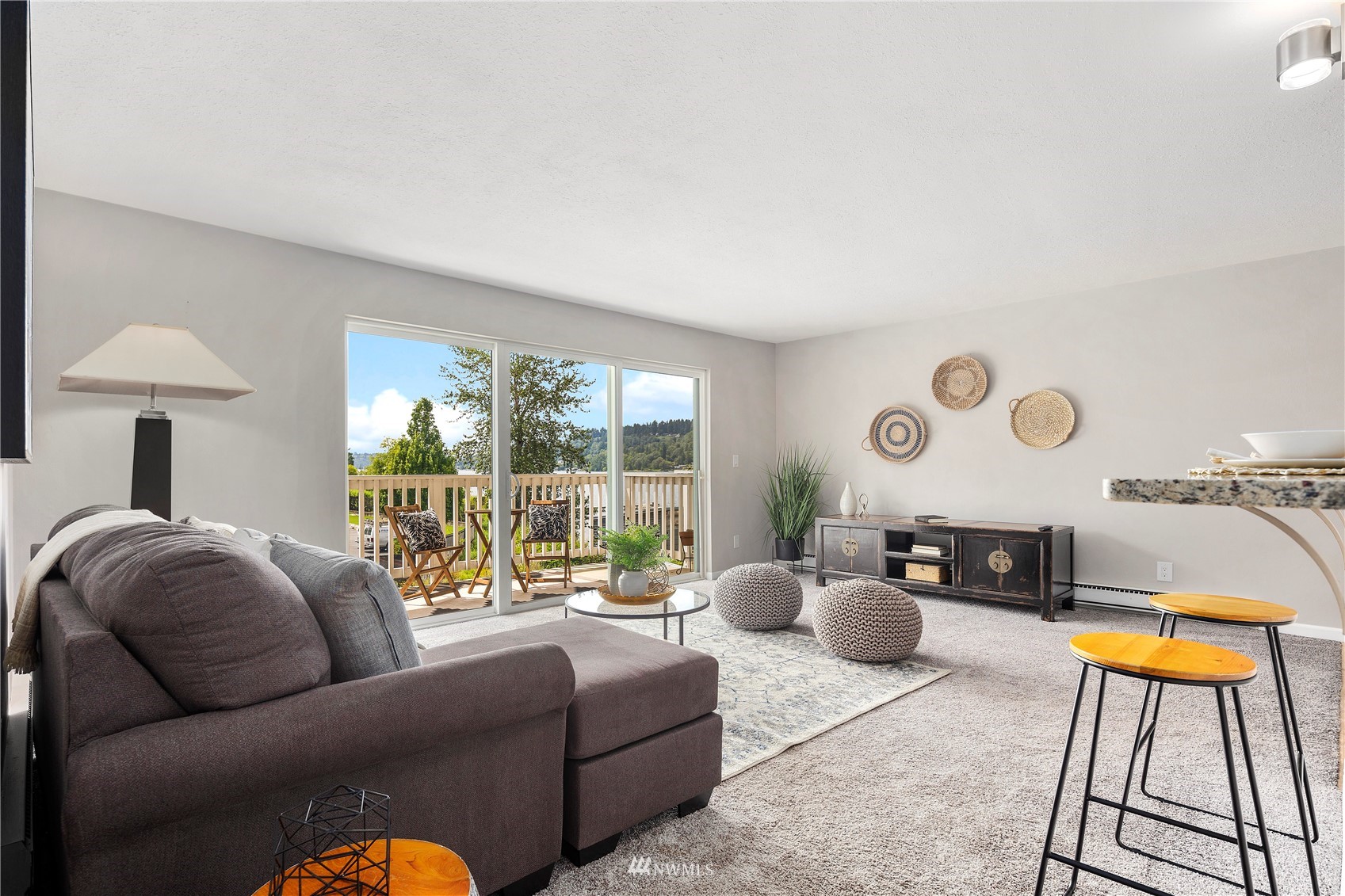 5021 Ripley Lane North, Unit 202 Renton, WA 98056 - Photo 8 of 35 a living room with furniture and a large window