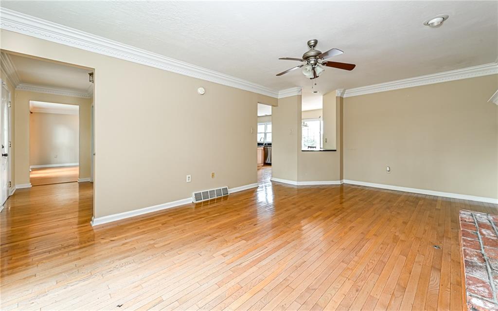 302 Ridgeway Drive Wexford, PA 15090 - Photo 11 of 28 wooden floor in an empty room with a window