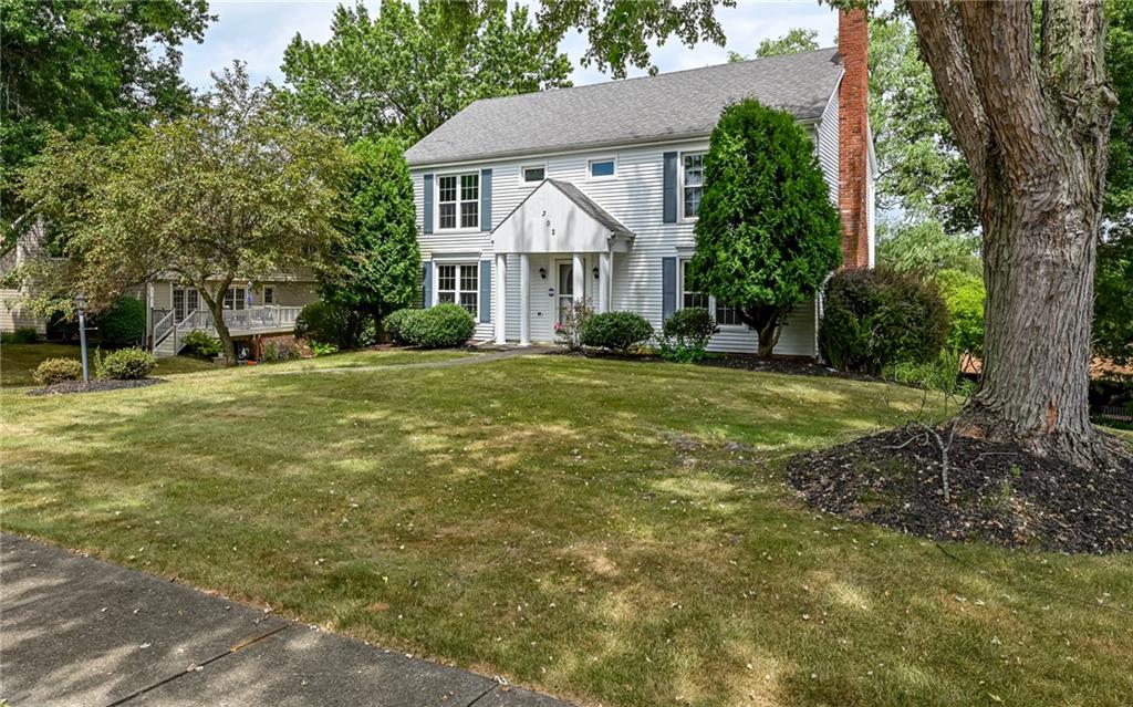 302 Ridgeway Drive Wexford, PA 15090 - Photo 2 of 28 a view of a house with a yard and large trees