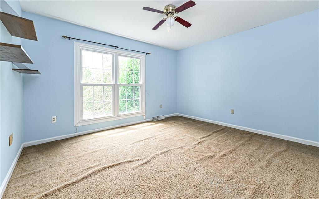 302 Ridgeway Drive Wexford, PA 15090 - Photo 23 of 28 a view of empty room with ceiling fan