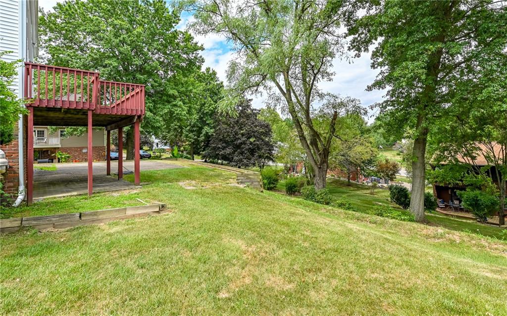 302 Ridgeway Drive Wexford, PA 15090 - Photo 28 of 28 a view of a park with table and chairs and a large tree