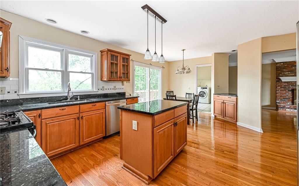302 Ridgeway Drive Wexford, PA 15090 - Photo 4 of 28 a kitchen with stainless steel appliances granite countertop a stove a sink and a refrigerator