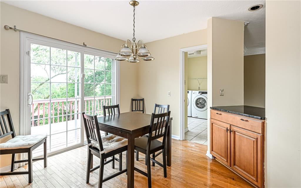 302 Ridgeway Drive Wexford, PA 15090 - Photo 5 of 28 a view of a dining room with furniture window and wooden floor