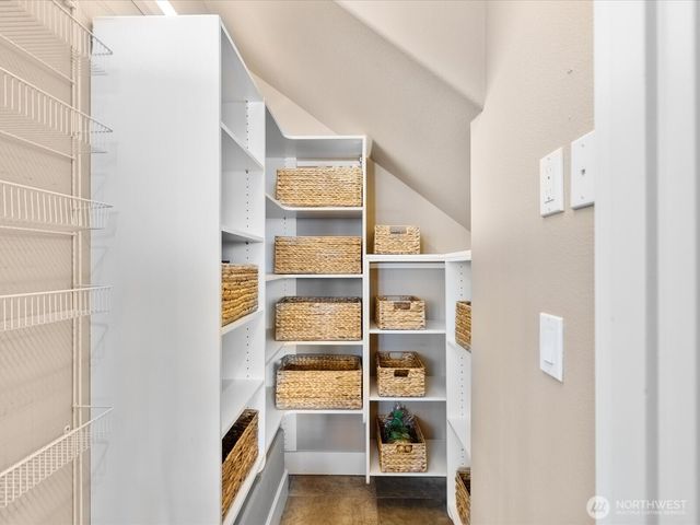 a room with furniture and a book shelf