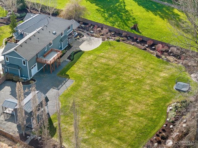 a view of a swimming pool with sitting area