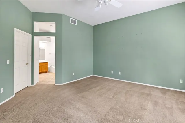 an empty room with a bathroom