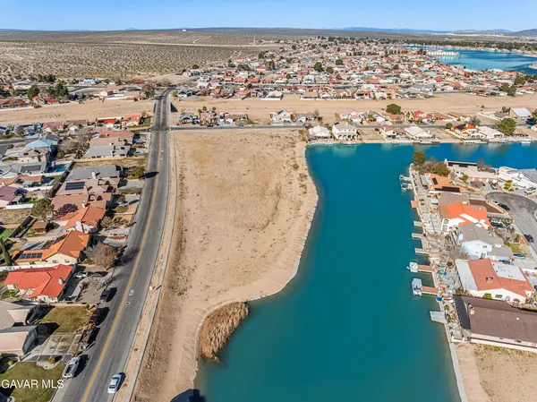 an aerial view of a house with a outdoor space