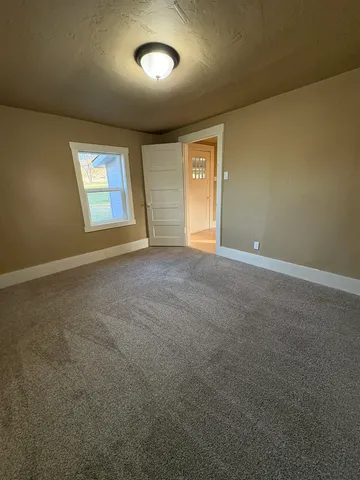 an empty room with a window