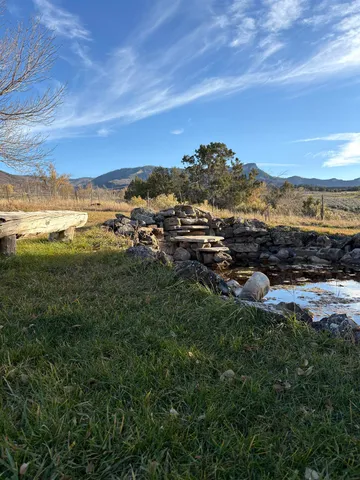 a view of a lake with mountains in the background