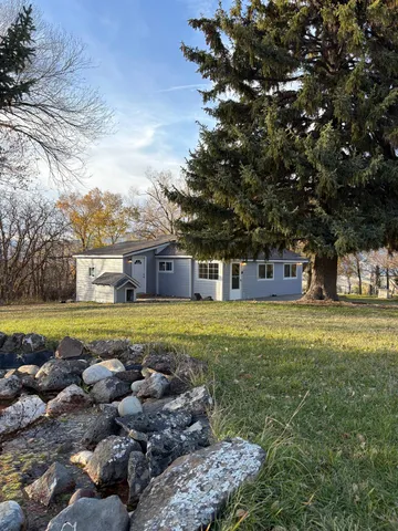 a view of a house with a big yard