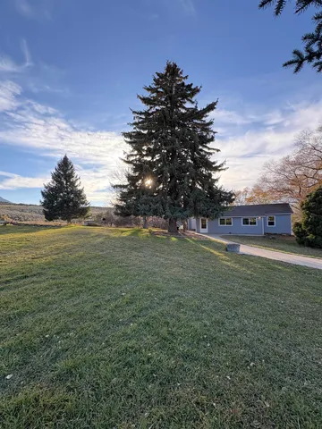 a view of an outdoor space and a yard
