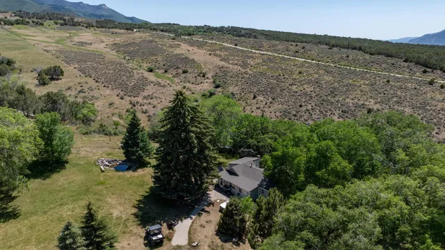 a view of a lake with mountains in the background