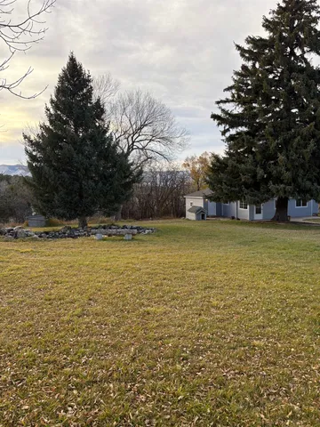 a view of a swimming pool and an outdoor space