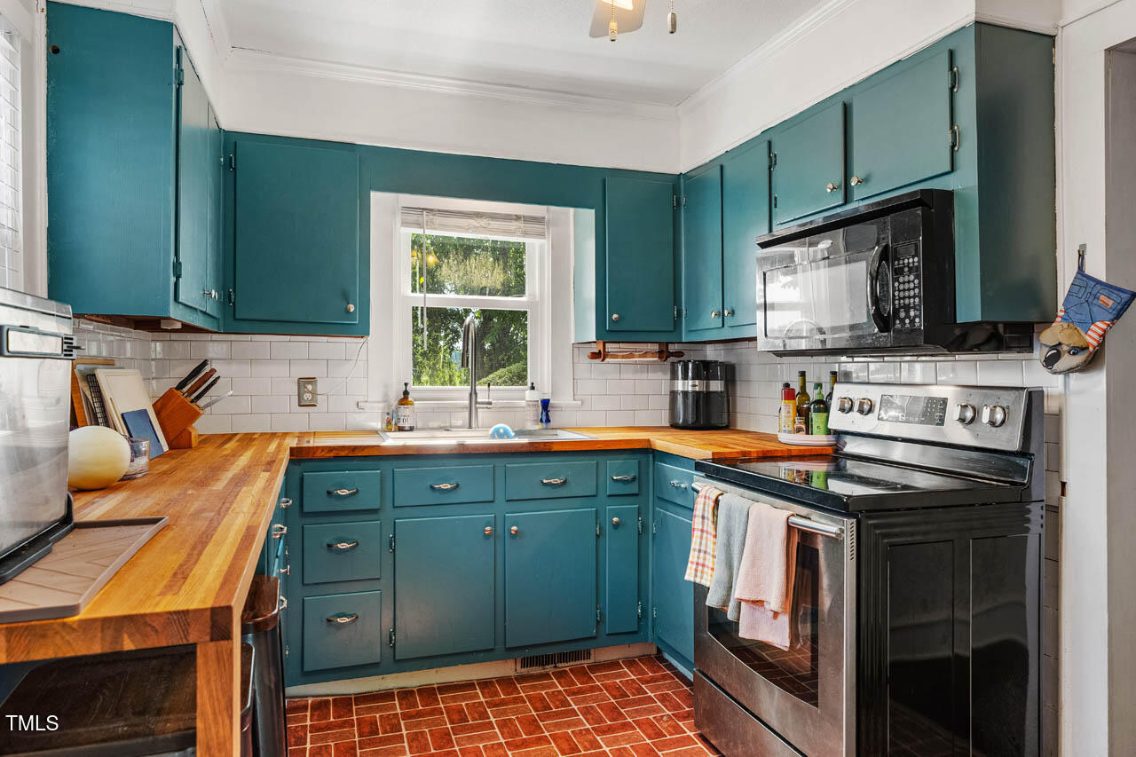 Look at those custom butcher block countertops!