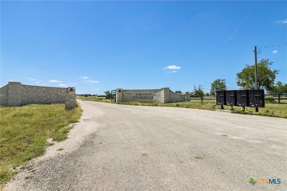 Lot 12 Reeh Road Harper, TX 78631 - Photo 17 of 17 a view of a road with a building in the background