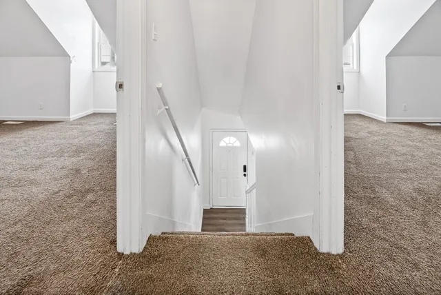 a view of entryway with stairs