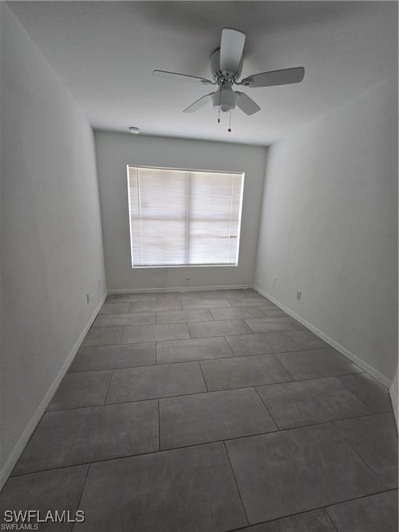 4520 19th Street Southwest Lehigh Acres, FL 33973 - Photo 11 of 11 a view of an empty room with a window