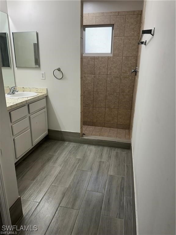 4520 19th Street Southwest Lehigh Acres, FL 33973 - Photo 6 of 11 a bathroom with a sink a toilet and shower