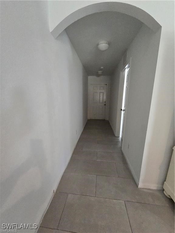 4520 19th Street Southwest Lehigh Acres, FL 33973 - Photo 8 of 11 a view of a big room with closet and windows