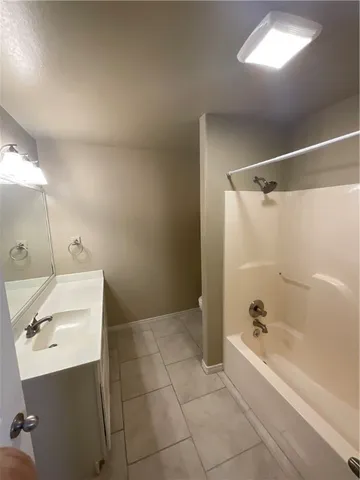 a view of a balcony with wooden floor and outdoor space