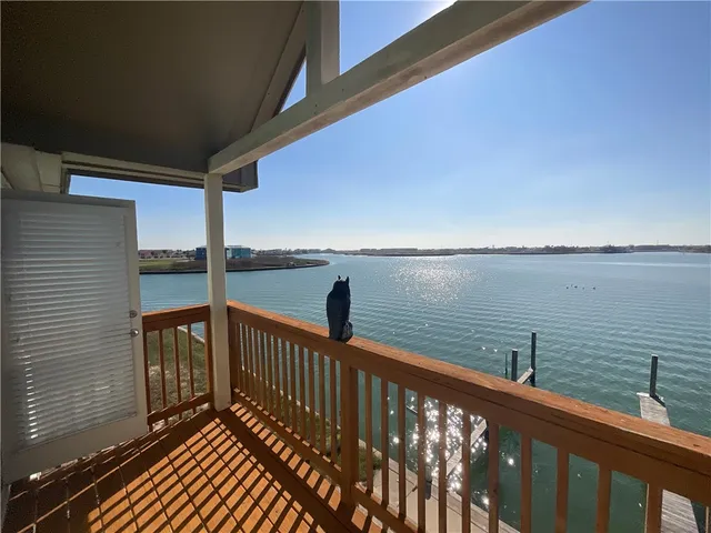 a balcony with sitting area