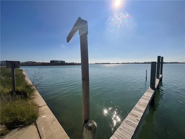 a view of a balcony next to a lake view
