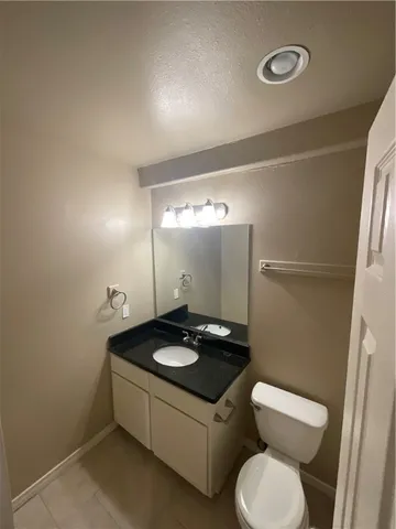 a bathroom with a sink and a toilet