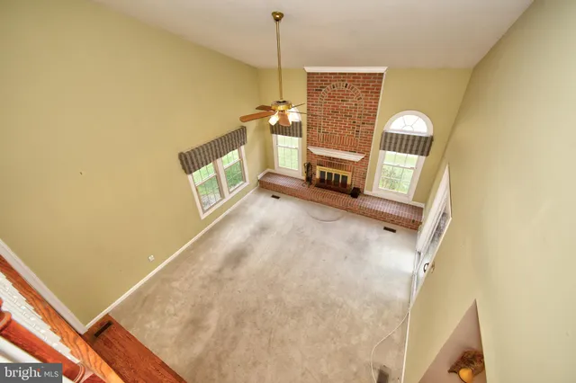 a view of a hallway with windows