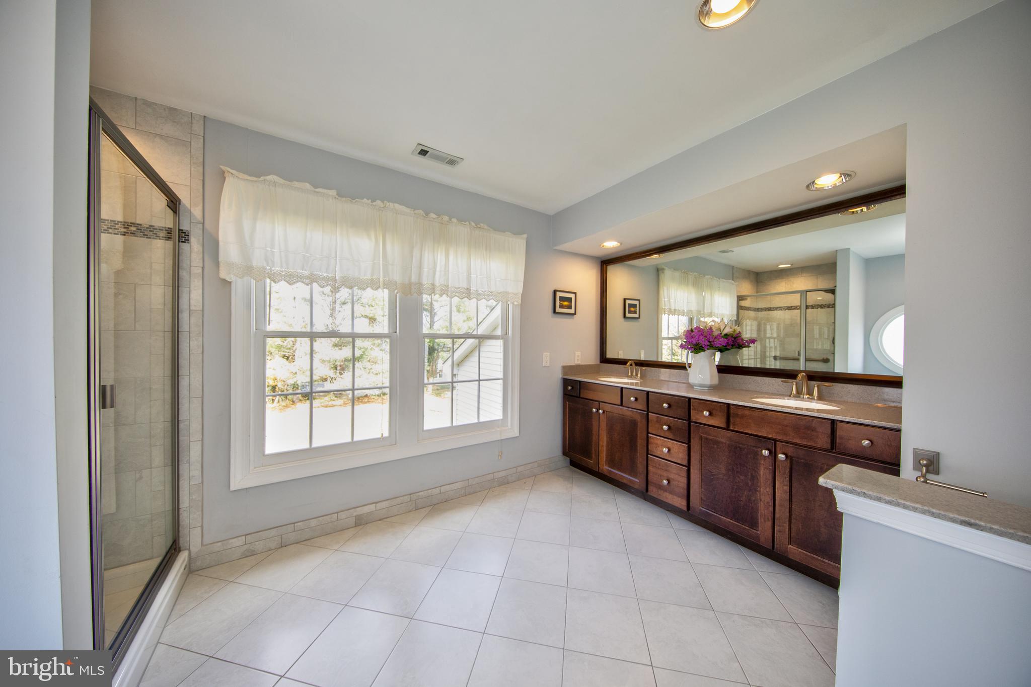 2502 Lady Ann Court Churchville, MD 21028 - Photo 23 of 48 a large kitchen with stainless steel appliances granite countertop a large window