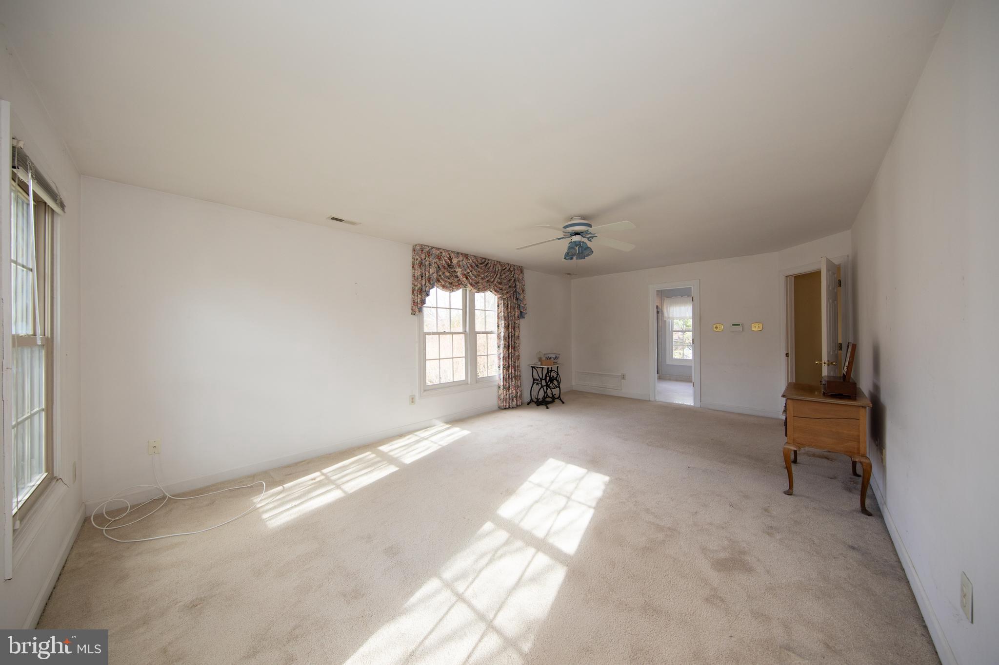 2502 Lady Ann Court Churchville, MD 21028 - Photo 26 of 48 a view of a livingroom with a window and wooden floor