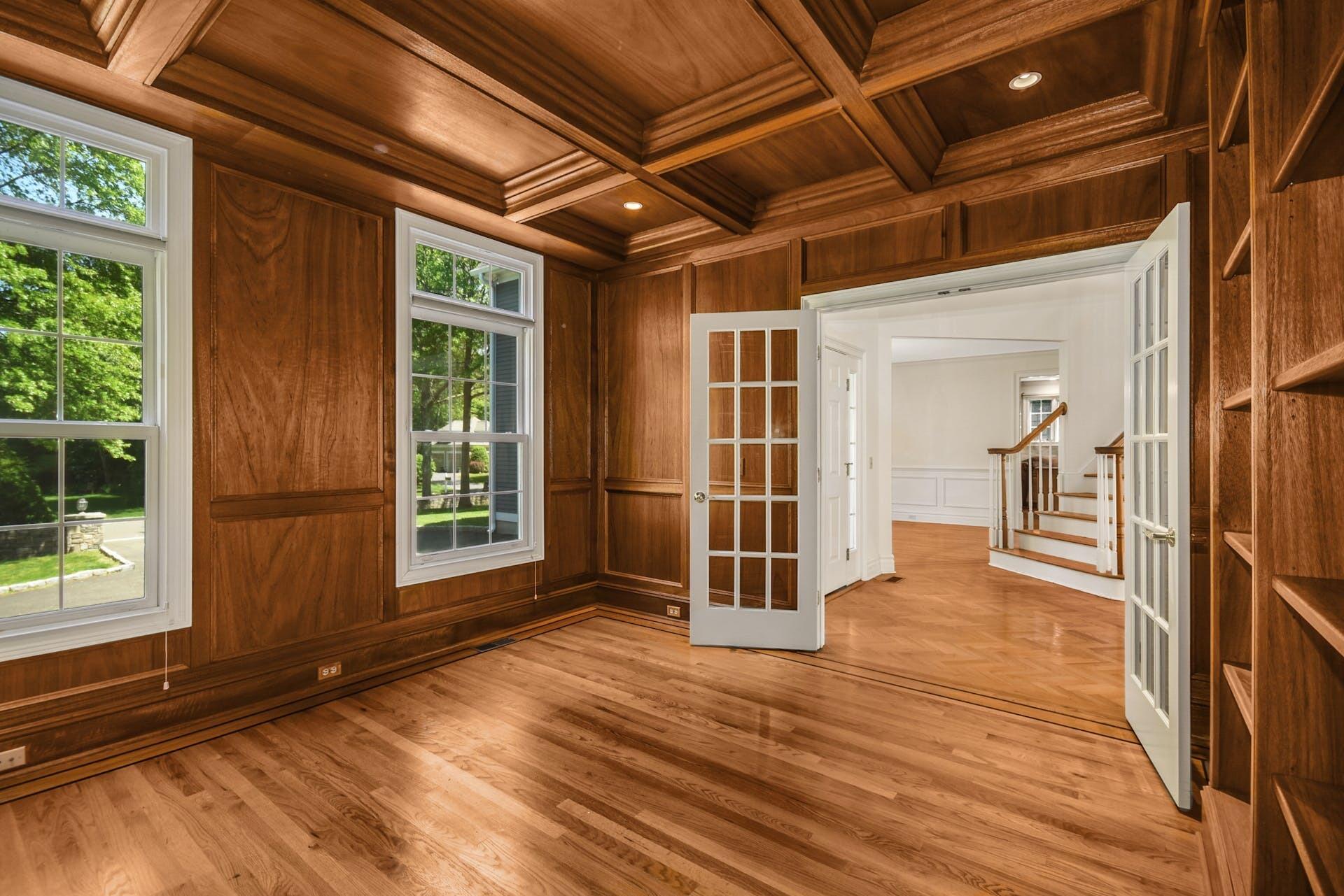 5 Christopher Lane Norwalk, CT 06851 - Photo 12 of 46 an empty room with wooden floor and windows