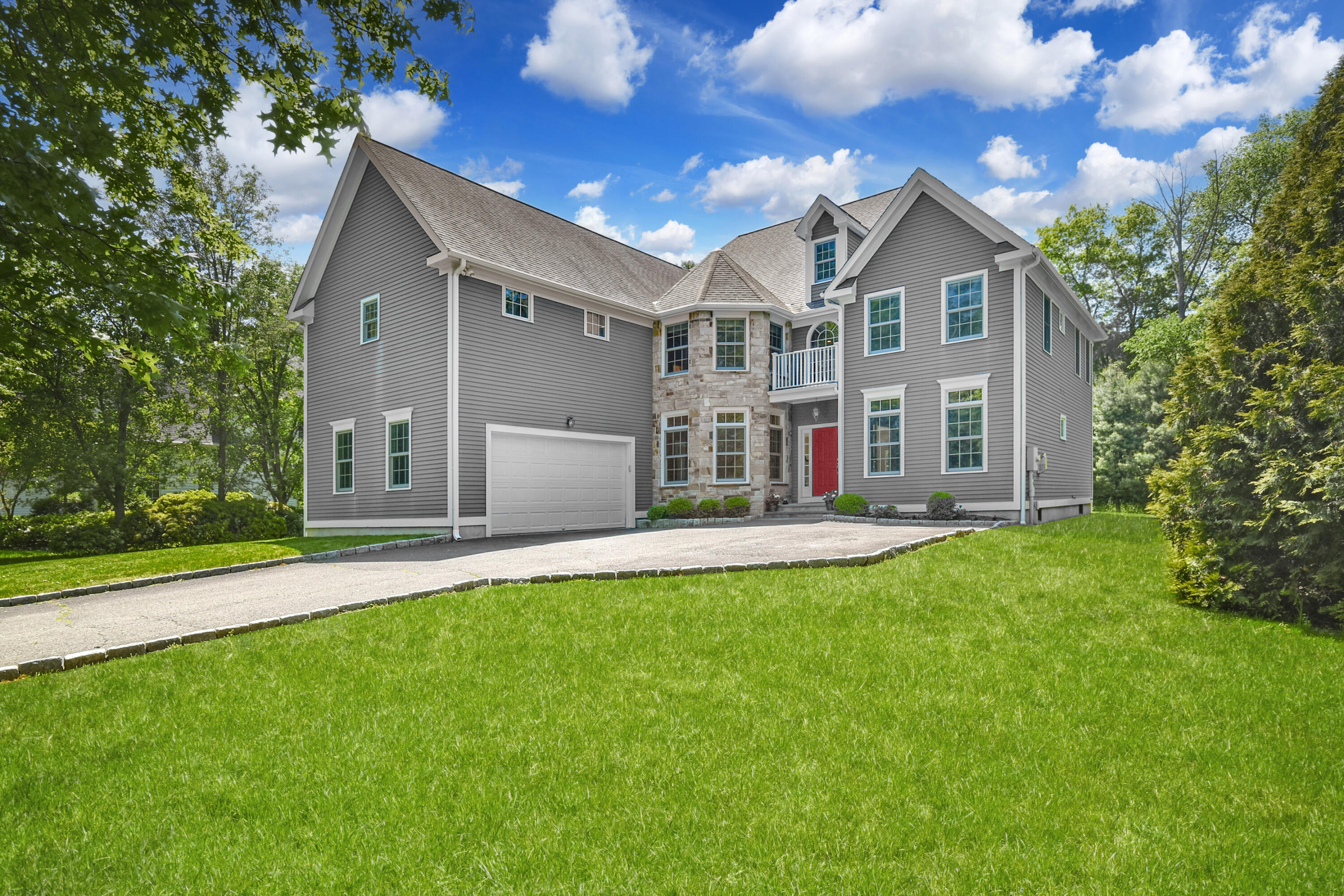 5 Christopher Lane Norwalk, CT 06851 - Photo 3 of 46 a view of a house with a yard and a patio