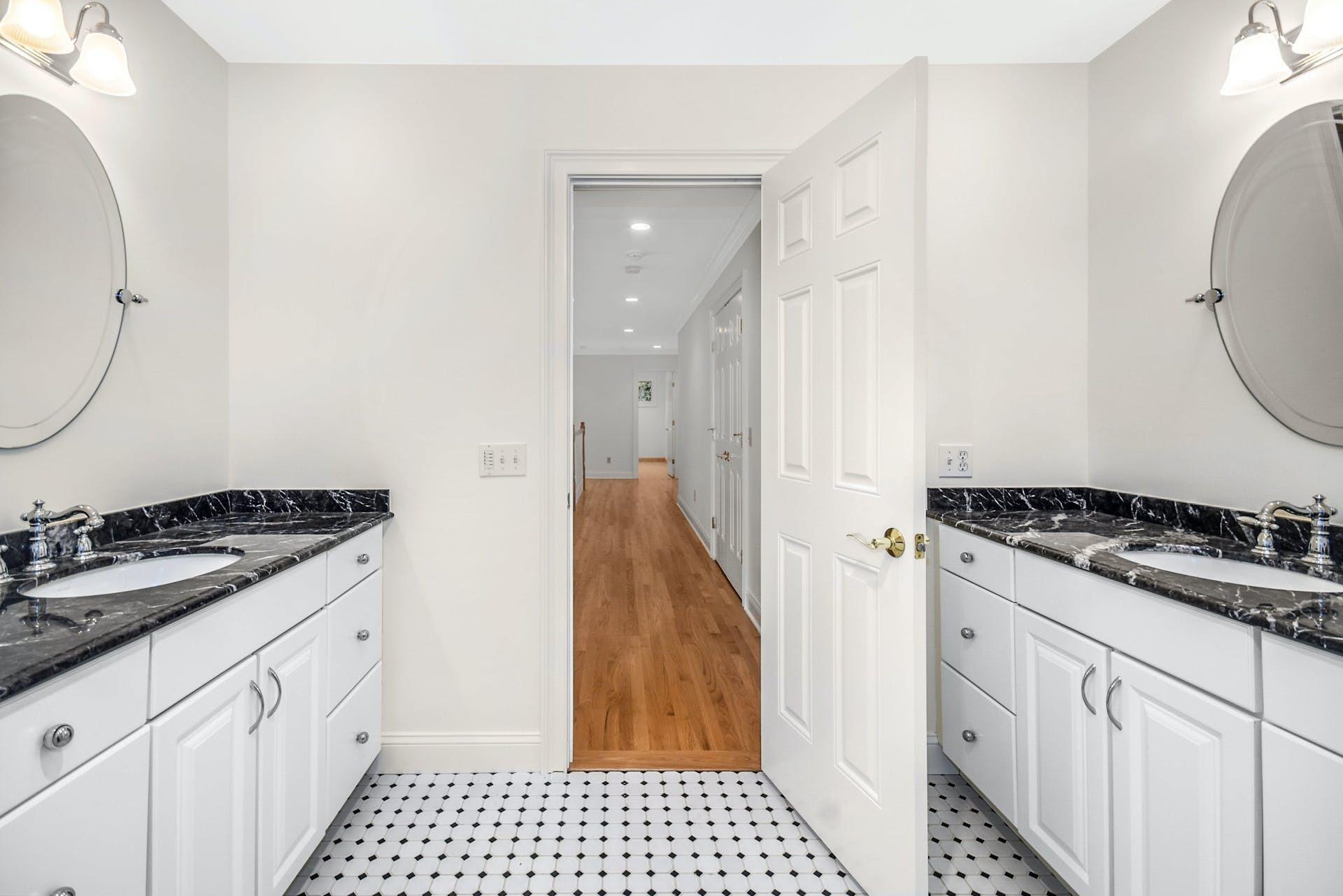 5 Christopher Lane Norwalk, CT 06851 - Photo 32 of 46 a kitchen with granite countertop a stove and a sink