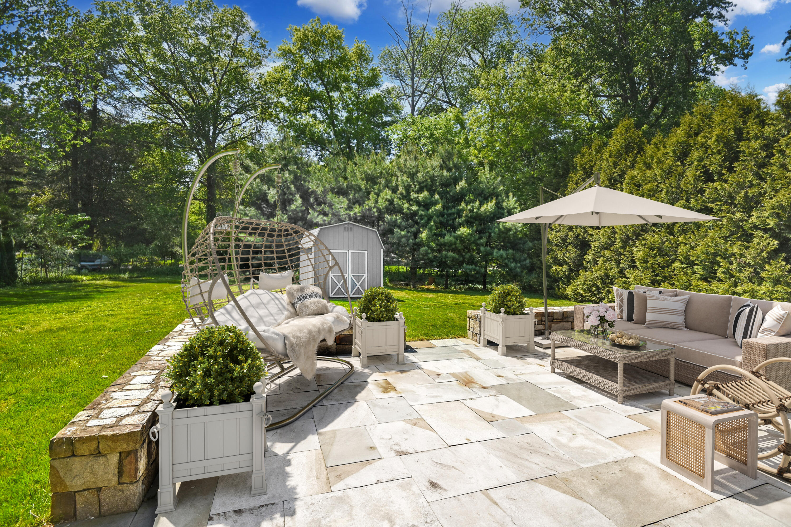 5 Christopher Lane Norwalk, CT 06851 - Photo 35 of 46 a view of a patio with furniture and a garden