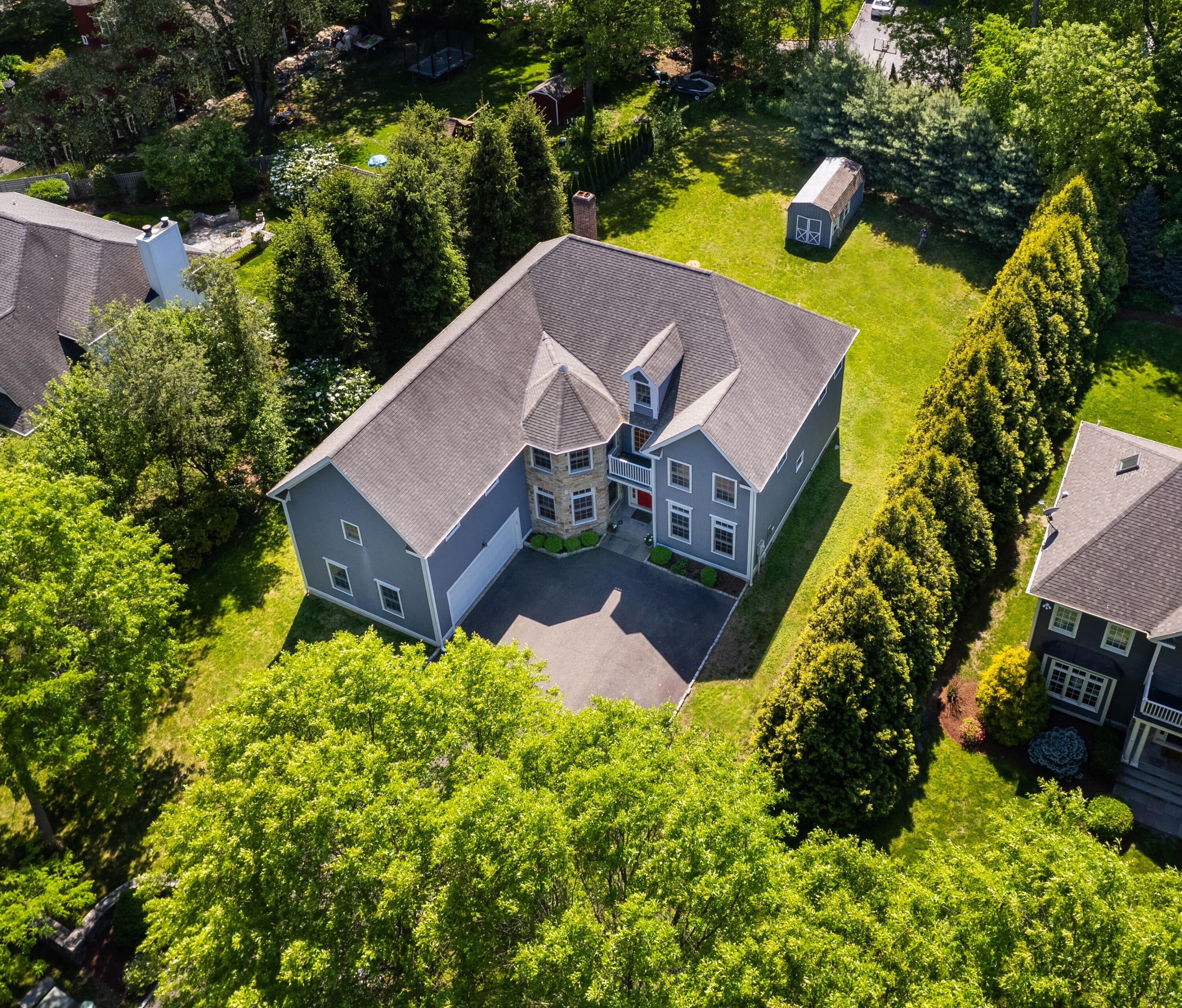 5 Christopher Lane Norwalk, CT 06851 - Photo 36 of 46 an aerial view of a house with a big yard and large tree