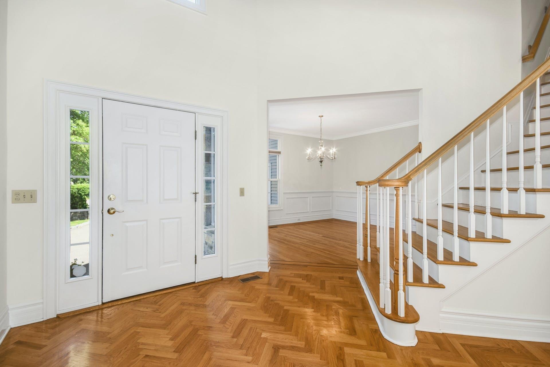 5 Christopher Lane Norwalk, CT 06851 - Photo 6 of 46 a view of an entryway with wooden floor