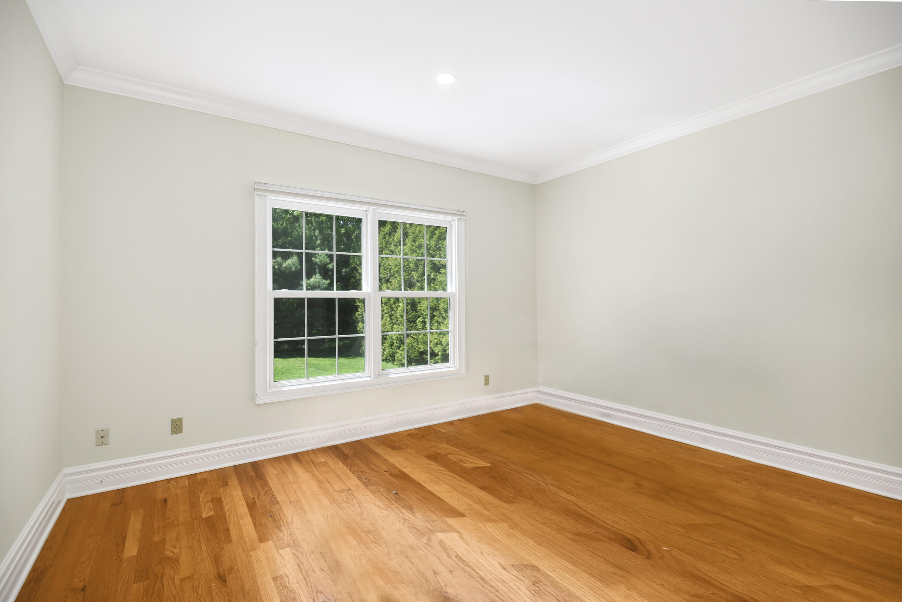 5 Christopher Lane Norwalk, CT 06851 - Photo 10 of 46 an empty room with a window