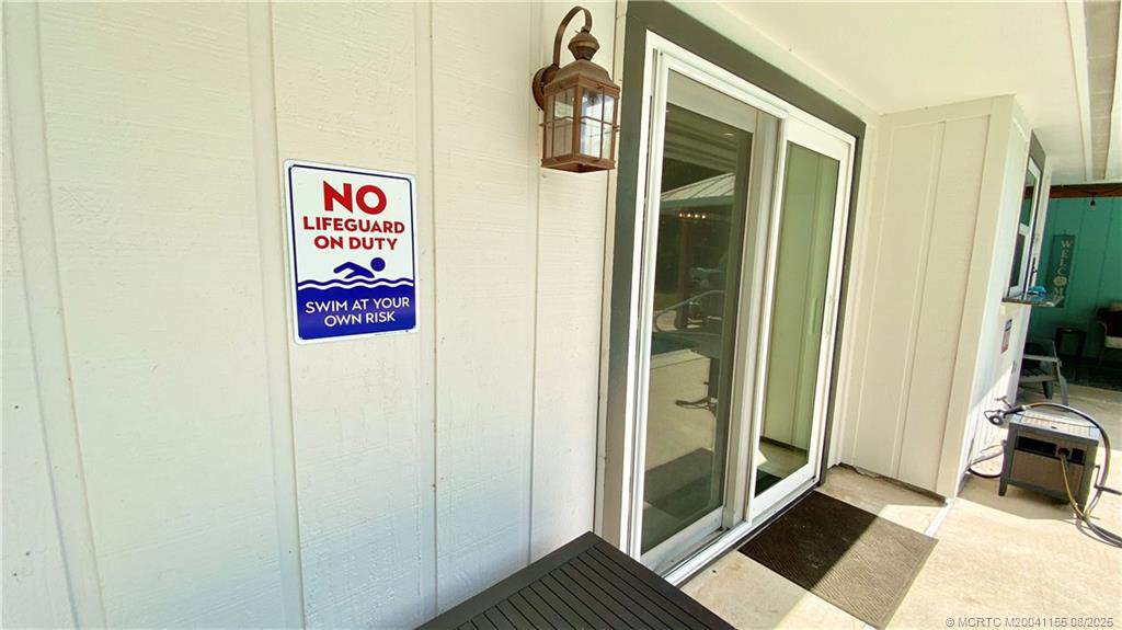 323 Southwest Ridge Lane Stuart, FL 34994 - Photo 16 of 29 a view of an entryway with wooden floor