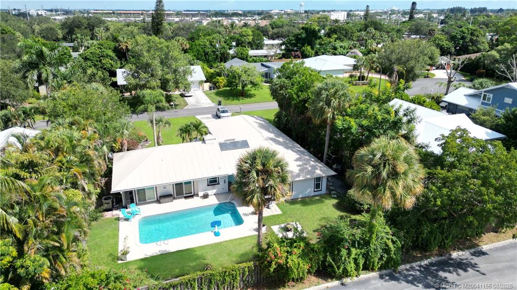 323 Southwest Ridge Lane Stuart, FL 34994 - Photo 4 of 29 an aerial view of a house with a yard