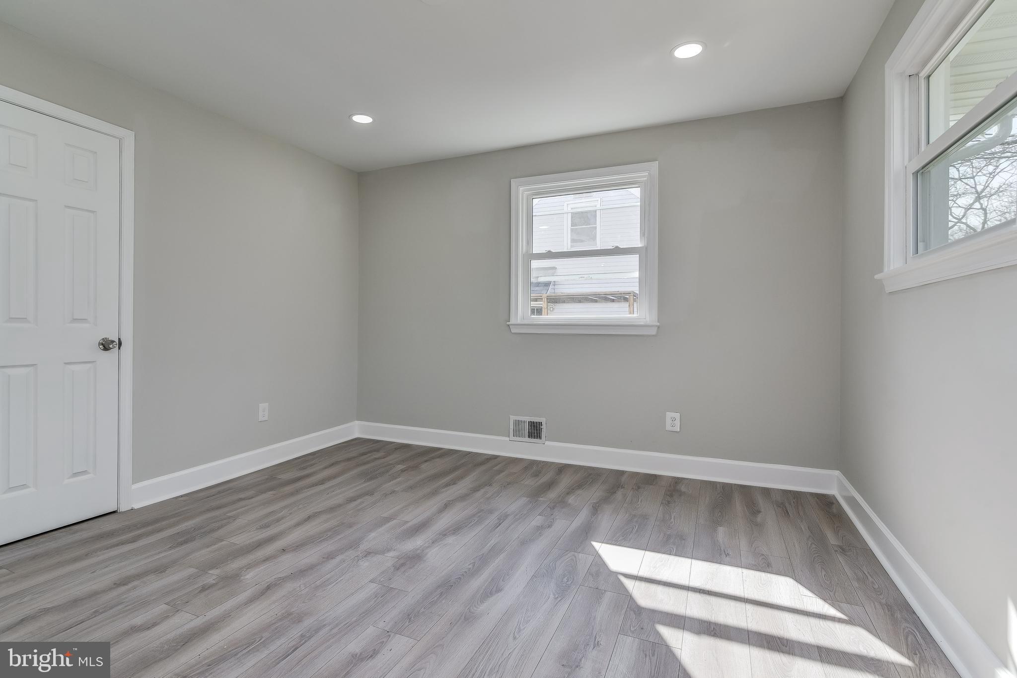910 Robin Road Silver Spring, MD 20901 - Photo 17 of 49 Separate Living Room with Coat Closet