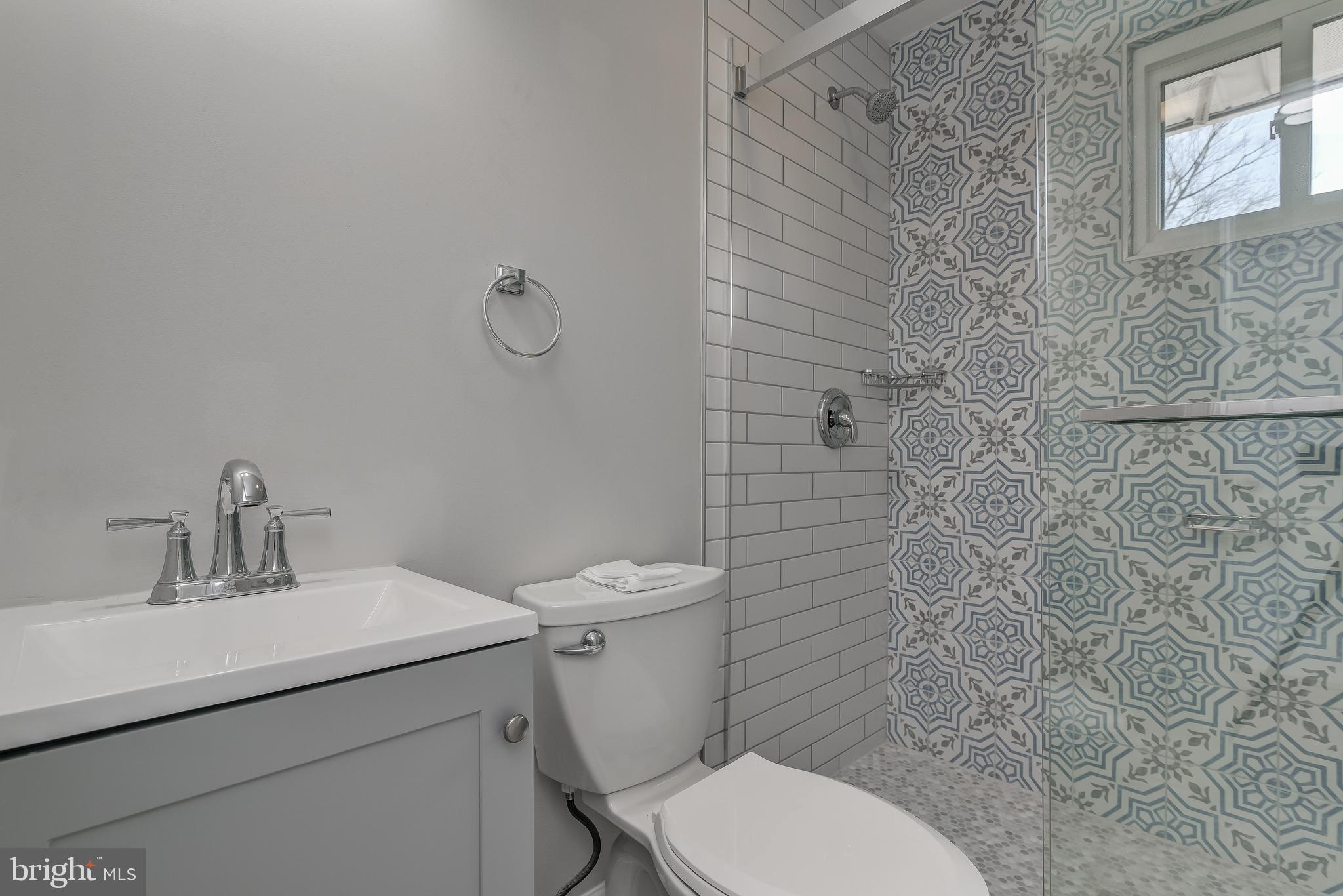 910 Robin Road Silver Spring, MD 20901 - Photo 23 of 49 Main Level Remodeled Bathroom With Shower