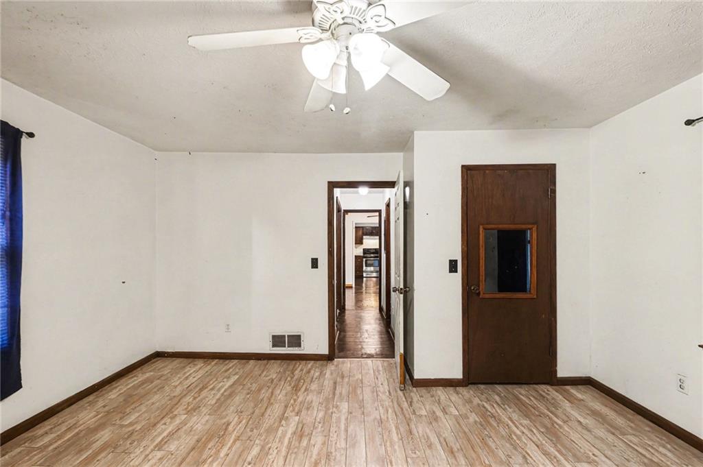 4365 Carrollton Villa Rica Highway Villa Rica, GA 30180 - Photo 13 of 30 wooden floor in an empty room with a window