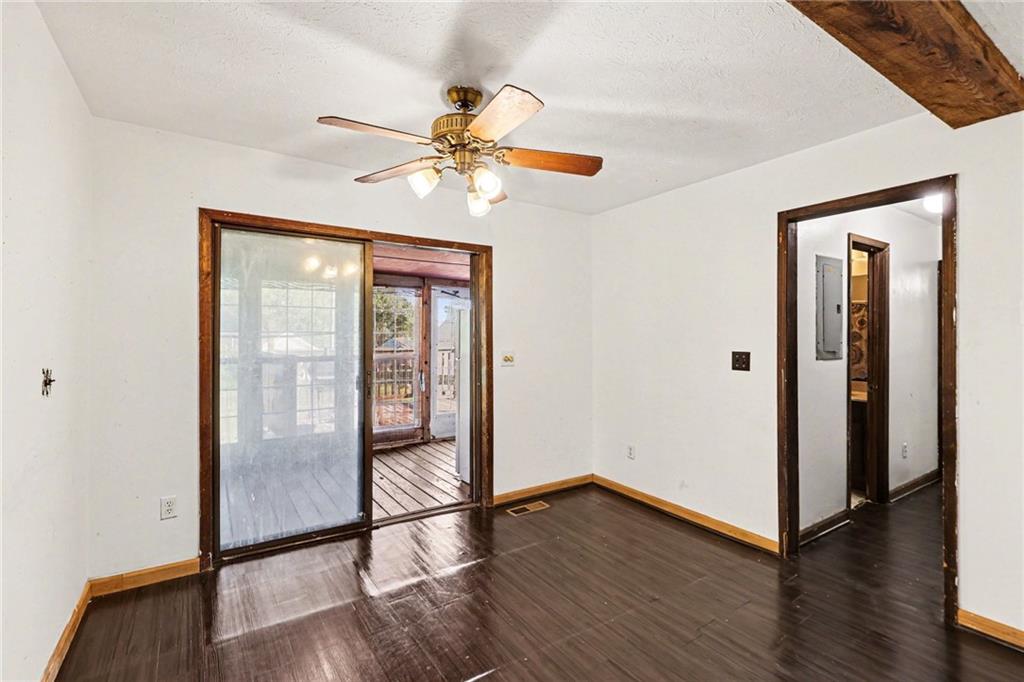 4365 Carrollton Villa Rica Highway Villa Rica, GA 30180 - Photo 24 of 30 a view of an empty room with wooden floor and a window