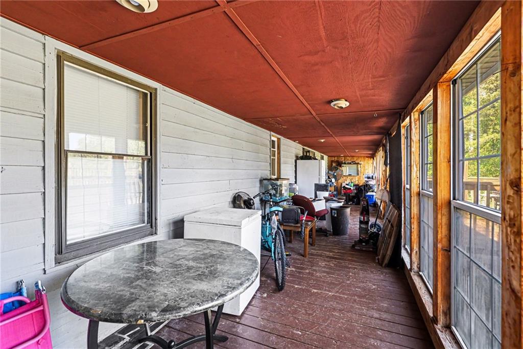 4365 Carrollton Villa Rica Highway Villa Rica, GA 30180 - Photo 26 of 30 a view of a dining room with furniture window and wooden floor