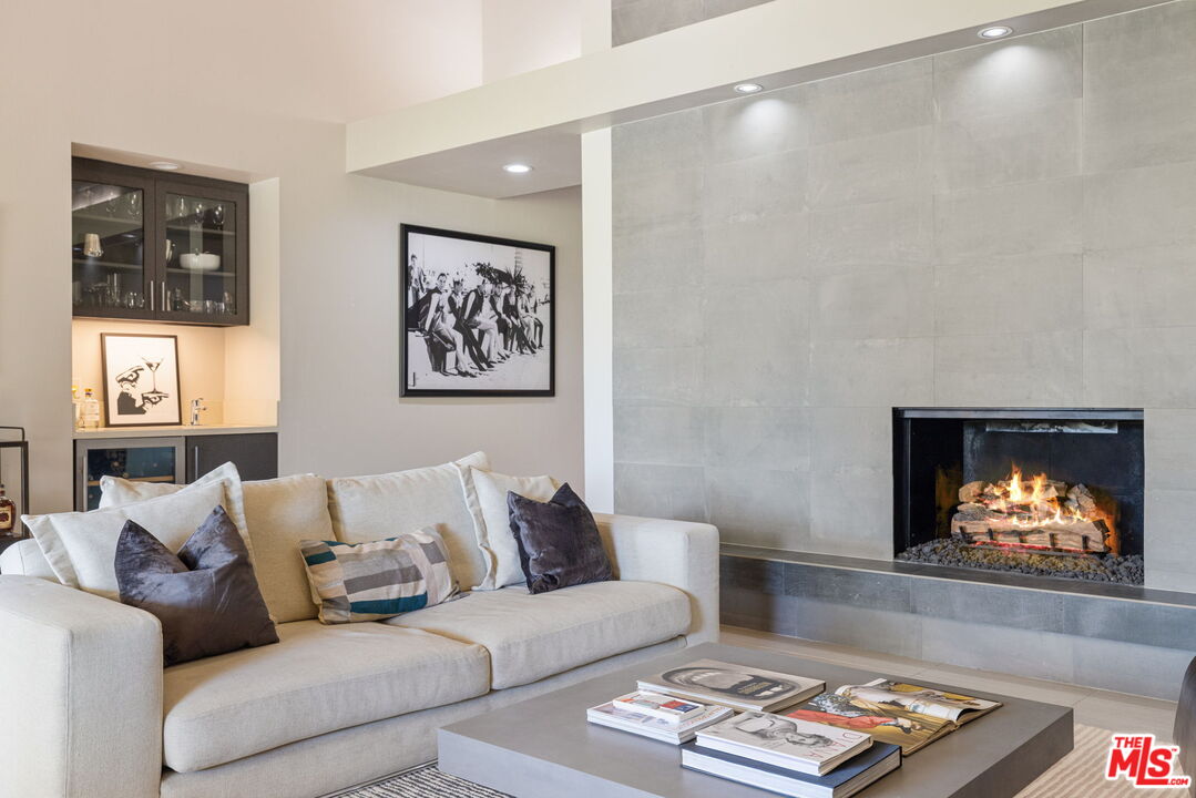 155 Desert W Drive Rancho Mirage, CA 92270 - Photo 15 of 50 a living room with furniture and a flat screen tv